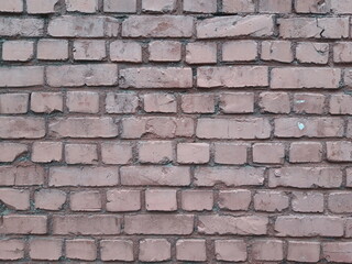 Red low-colour painted brick wall image