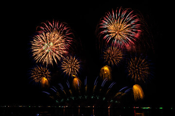 PATTAYA, CHONBURI, THAILAND, Real Fireworks at Pattaya bay, Pattaya national Fireworks Festival contest, November of every Year, Beautiful of bright light fireworks Show in middle sea, for postcard 