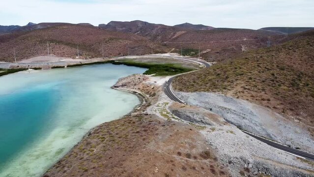 Beautiful panorama aerial shot over a beautiful coastal area with beach and blue sea at Playa El Tecolote in Baja California Sur, Mexico