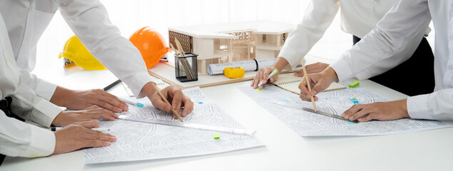 Worker, architect and engineer work on real estate construction project oratory planning with cartography and cadastral map of urban town area to guide to construction developer business plan of city - obrazy, fototapety, plakaty