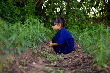 young girl farms with happiness.