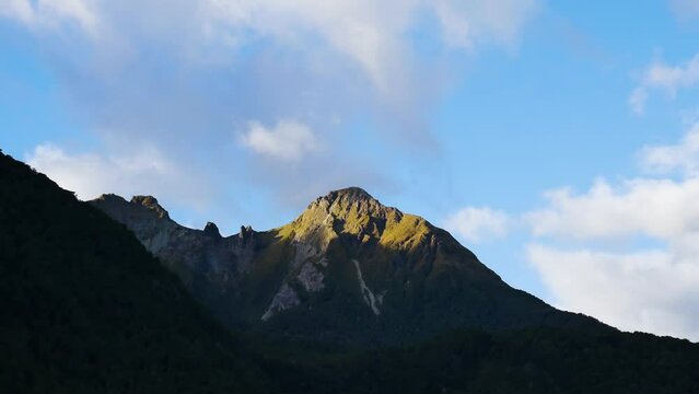 timelapse of clouds around remote mountain peak in New Zealand