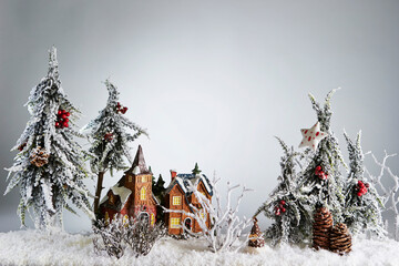 Snow-covered miniature houses, toy houses	