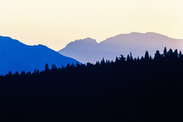 Rocky mountain in silhouettes at beautiful sunset light