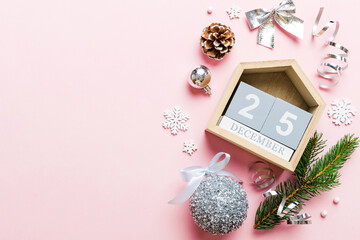 Christmas calendar 25 december. Christmas gift, fir branches, pine cones. Flat lay, top view. New...