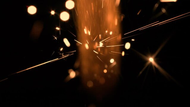 600fps super slowmotion fireworks: Close up sparkler, red, horizontal format UHD Video