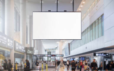 blank billboard. with Blurred image of people walking in airport terminal