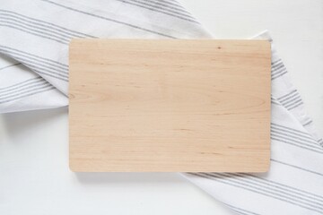 Natural wood kitchen cutting board mockup for engraving design or text presentation, minimal style...