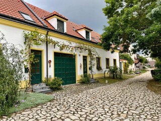 Repaired family house in Mikulov in Pavlovska street with a vine over the entrance. The concept of quiet family living in a small town. High quality photo