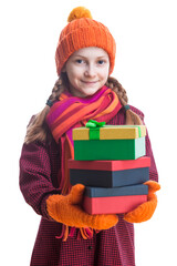 One Smiling Caucasian Girl With Heap of Gift Boxes Posing in Winter Outfit Against Pure White in Studio.