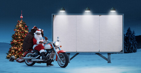 Biker Santa Claus and blank billboard sign