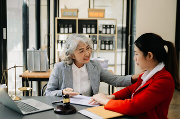 Business and Female lawyer or judge consult having team meeting with client, Law and Legal services concept.Customer service good cooperation .