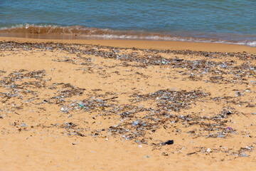Polluted beach with numerous plastic waste on a beach of the Mediterranean sea in Tipasa, Tipaza,...