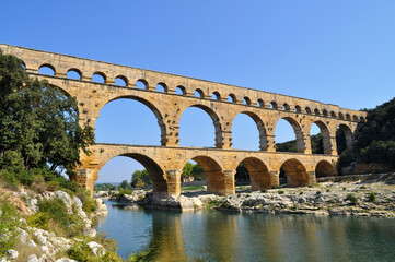 Fototapeta premium The old Roman Viaduct Pont du Gard in the south of France in the Provence region. Historical monument building.