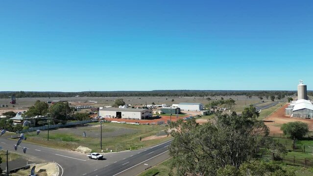 Australian birds flying around drone and settling into trees at Wallumbilla in western Queensland, Australia