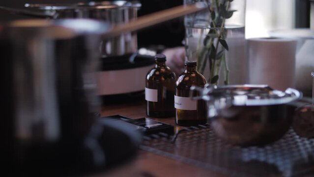 The perfume jars are on the table in the workshop