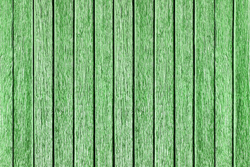 Vertical green lines. Green peeling paint wood plank texture. Outdoor, weathered summer house wall....