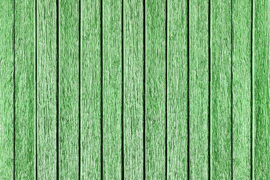 Vertical green lines. Green peeling paint wood plank texture. Outdoor, weathered summer house wall. Grunge wooden board background.	 Dry paint peel texture. Grunge bright green stripes.
