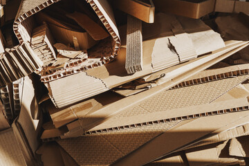 Stack of Cardboard Waste in sunlight. Concepts of Paper Recycling and Waste Sorting
