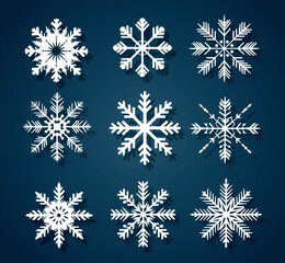 Naklejka na ściany i meble White snowflakes on a blue background for winter design. Christmas and New Year elements concept. Vector snowflakes. Snowflakes in flat style. Holiday wallpaper