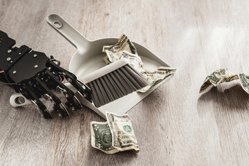 Robotic hand wielding a dustpan and brush, meticulously sweeping up one-dollar bills