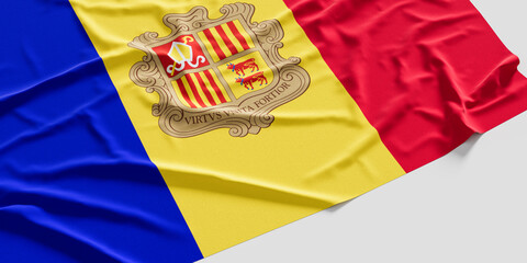 Flag of Andorra. Fabric textured Andorra flag isolated on white background. 3D illustration