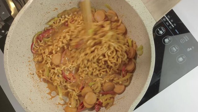 Stir-Fry Instant Noodles with Sausage and Melted Cheese