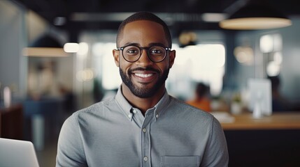 Portrait of African American professional businessman with blond hair looking at camera. Modern corporate office workplace scene.