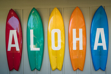 Aloha sign at Lava Lava Beach Club on ʻAnaehoʻomalu Beach, Hawaii Island, USA