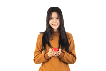 Asian Young Woman holding red heart isolated on white background with clipping path. health insurance, donation, happy charity volunteer concept, world mental health day, world heart day, csv concept