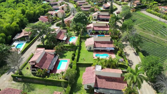 Aerial view of fincas with trees and pools close to Panaca in Quindio Colombia
