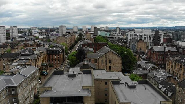 Aerial view of Glasgow city center high-end apartment building rooftops in Scotland, UK