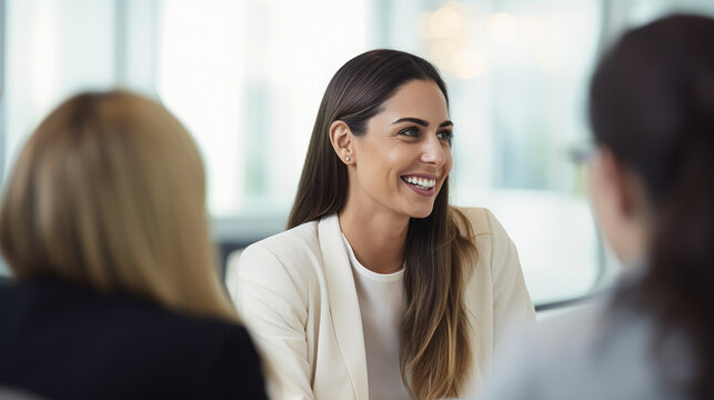 Dubai business woman talking with foreign business people
