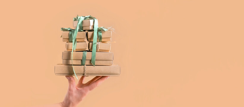Christmas.Christmas gift box zero waste,Boxing Day, eco friendly packaging gifts kraft paper eco christmas holiday concept handmade , eco decor christmas background pattern