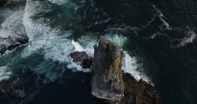 Flying over the Branaunmore sea stack of the Cliffs of Moher 4k