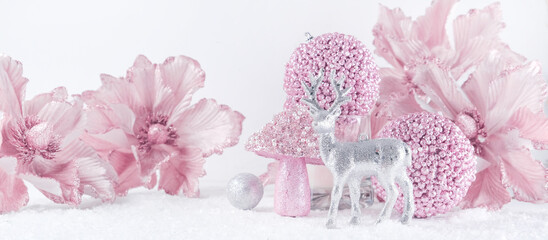 Merry Christmas. Christmas banner in pink color on a white Christmas background. Christmas background, pink xmas holiday card. Christmas card pink balls