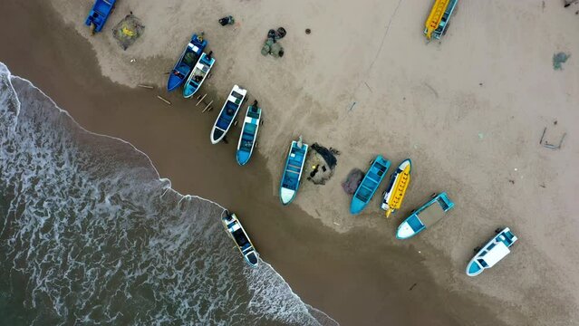 Montanita, Ecuador: 24-12-2022: top view of fishing boats and boats with a banana for tourist
