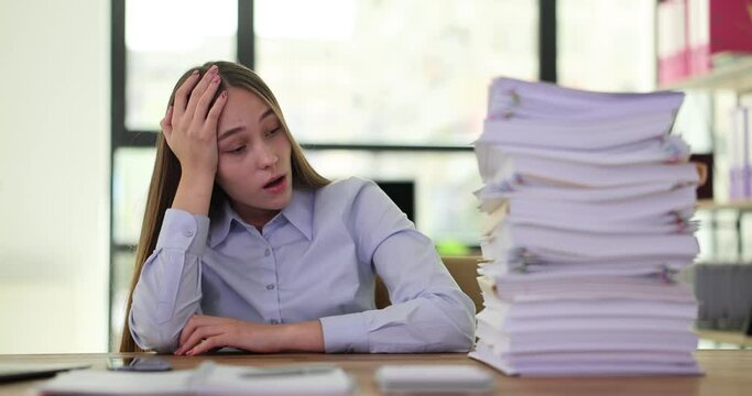 Student intern is stressed, tired from hard training and overloaded with paperwork. Overtime and fatigue