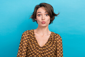 Photo of joking young lady wear blouse pouted lips playful childish girlfriend flirting coquettish tricky isolated on blue color background
