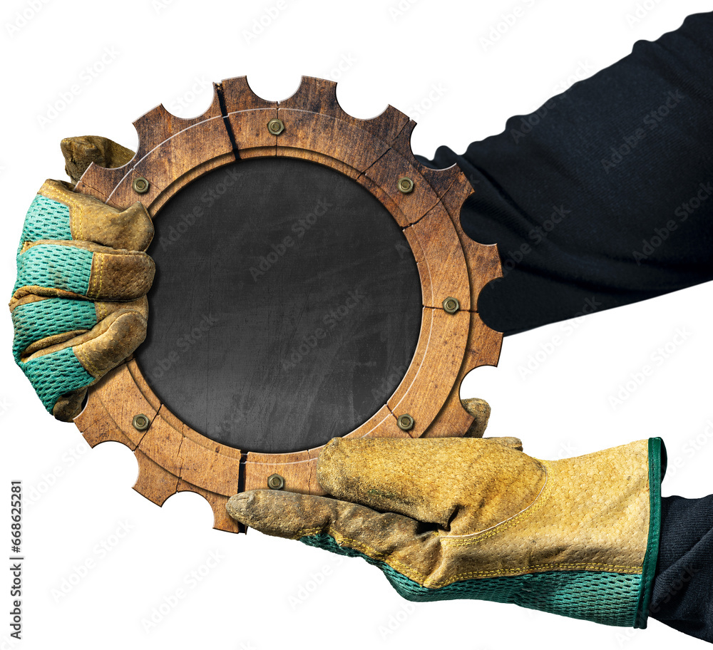Poster manual worker with work gloves holding a wooden cogwheel with empty blackboard inside. isolated on w