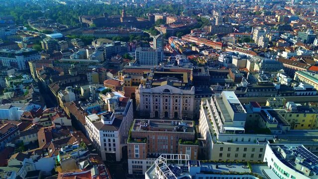 Aerial view of the Borsa Piazza Affari. Krishi houses in the city. Attractions for tourists. A crisis. Statue of the middle finger on the hand. Finance. Architecture. Italy, Milan, 10.2023