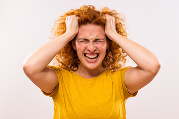 Image of angry ginger woman screaming.