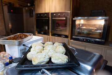 Baked bread displayed on a iron counter