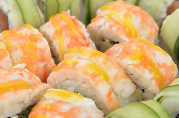 background of different sushi rolls