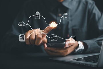 The businessman's hand points to the cloud icon, symbolizing the solution and connectivity offered by cloud technology document. Explore the digital landscape of a business service on the internet.