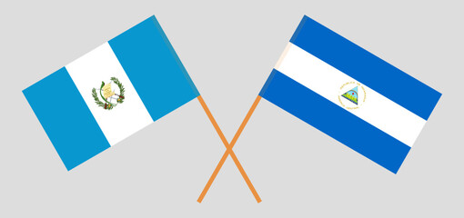 Crossed flags of Guatemala and Nicaragua. Official colors. Correct proportion