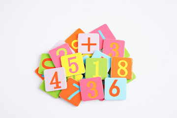 Number wood block cubes for learning Mathematic, education math concept.
