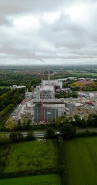 4k 60fps drone aerial footage of an construction site of a waste incineration plant