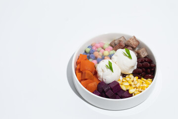Coconut milk ice-cream with dessert topping.