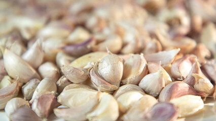 Garlic in cloves. lots of garlic with purple skin